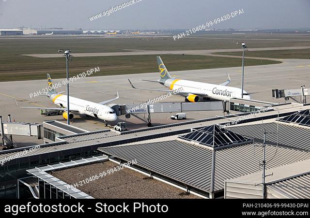 26 March 2021, Saxony, Schkeuditz: Only two Condor aircraft are grounded at Leipzig/Halle Airport. After an enforced break of more than four months