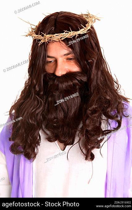 man dressed as Jesus.  And the soldiers plaited a crown of thorns, and put it on his head, and they put on him a purple robe, And said, Hail, King of the Jews