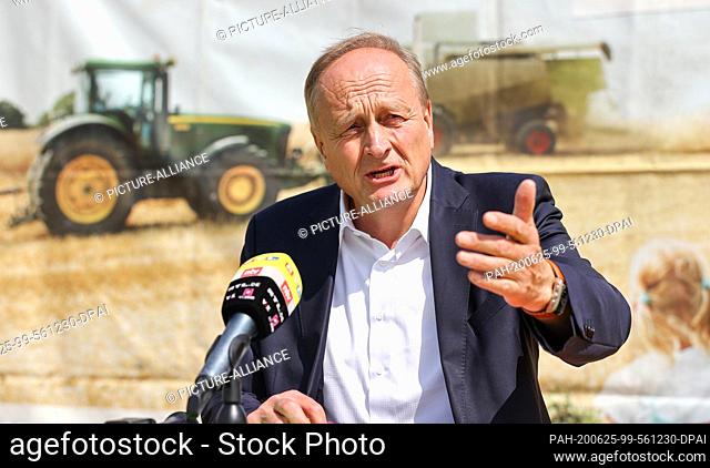25 June 2020, Saxony, Leipzig: Farmers' President Joachim Rukwied speaks at the Harvest Kick-off-Pk of the German Farmers' Association
