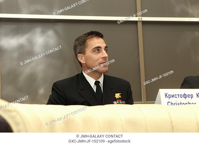 At the Gagarin Cosmonaut Training Center in Star City, Russia, Expedition 3536 Flight Engineer Chris Cassidy of NASA listens to a question from a reporter...