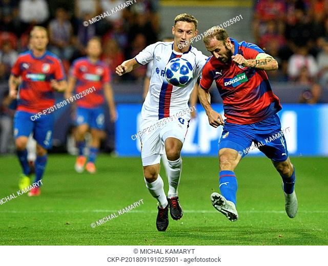 Fyodor Chalov of CSKA, left, and Roman Hubnik of Viktoria in action during the 1st round, Group G, Champions League match FC Viktoria Plzen vs CSKA Moscow in...