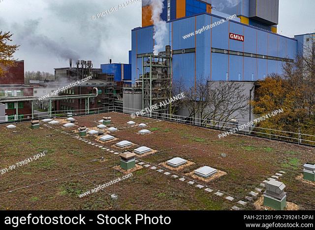 01 December 2022, North Rhine-Westphalia, Oberhausen: Plants grow on the roofs and facades of some buildings at the Lower Rhine Community Waste Incineration...