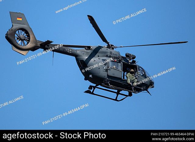 21 July 2021, North Rhine-Westphalia, Erftstadt: A Bundeswehr helicopter (H145M), which is normally used to drop special forces