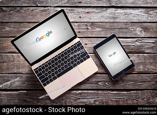 PRAGUE, CZECH REPUBLIC - SEPTEMBER 1, 2015: New Google logo on their search page immediately at the release date is displayed on a brand new macbook and ipad...
