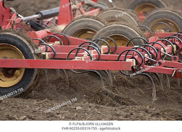 Close-up of harrows, cultivating arable field, Sweden, may