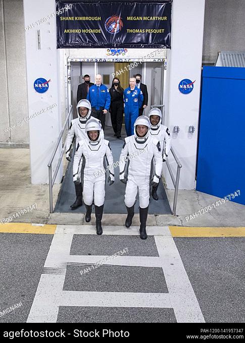 ESA (European Space Agency) astronaut Thomas Pesquet, back left, NASA astronauts Megan McArthur, front left, and Shane Kimbrough, front right