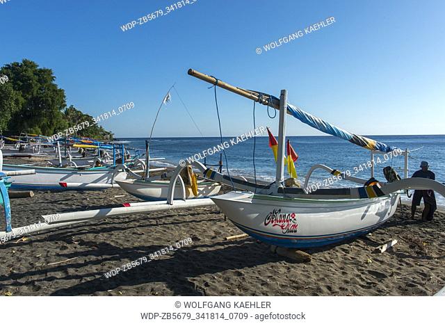 Traditional Balinese fishing boats (Junkung) on a beach in Amed, East Bali, Indonesia