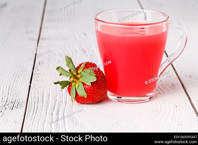 Berry liquid pudding with strawberry