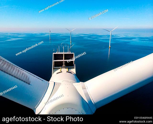 Wind turbine from aerial view, Drone view at windpark westermeerdijk a windmill farm in the lake IJsselmeer the biggest in the Netherlands