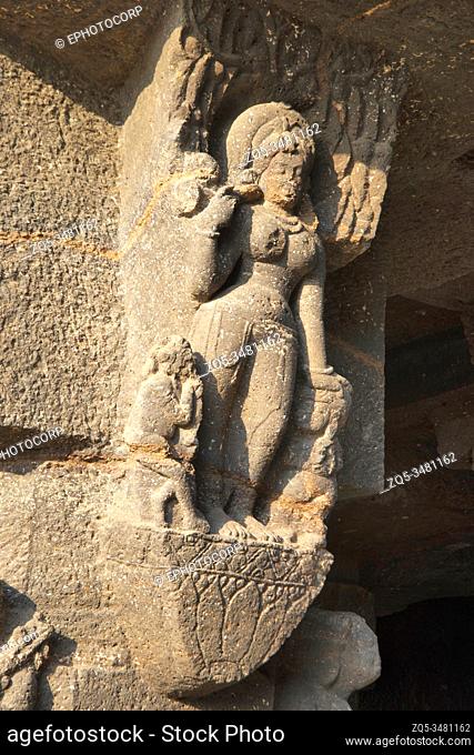 Ellora Caves, Aurangabad, Maharashtra, India Cave No. 18, Figure of Salbhanjika (tree goddess) with attendant and dwarf on one of the pillar
