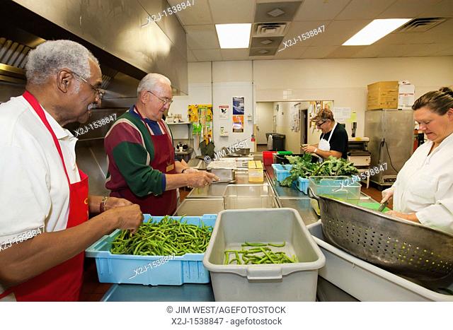 Detroit, Michigan - Volunteers process produce at the Capuchin Soup Kitchen  The produce is grown at the Capuchins' own garden