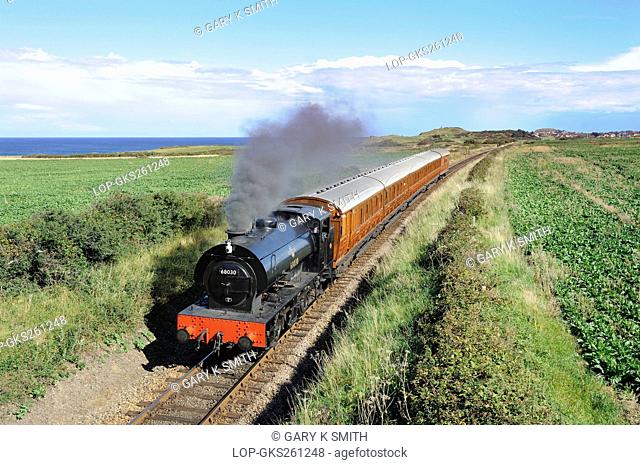 England, Norfolk. Steam locomotive 68030 'Hunslet Austerity 3777', an ex-coal board saddle tank on the North Norfolk Railway NNR
