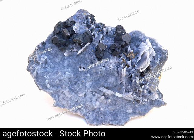 Enargite (dark crystals) is a copper arsenic sulfosalt mineral. Crystallized sample surrounded by baryte