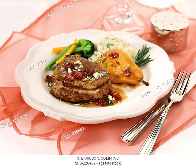 Beef steak with pear and cranberries