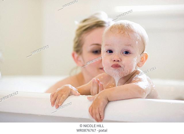 mother and baby taking a bubble bath