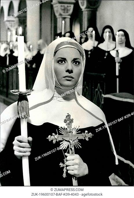 Feb. 26, 2012 - Candle And Cross clutched in her hands, Sister Virginia kneels before the Archbishop. Giovanna Ralli as the nun in a scene from the Italian film