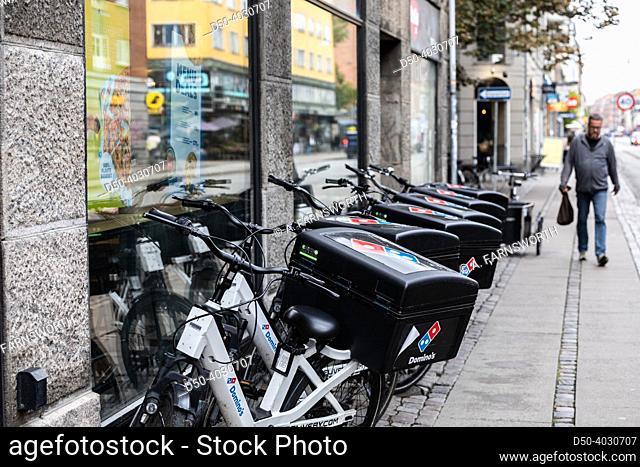 Copenhagen, Denmark A row of Domino's pizza electric delivery bicycles