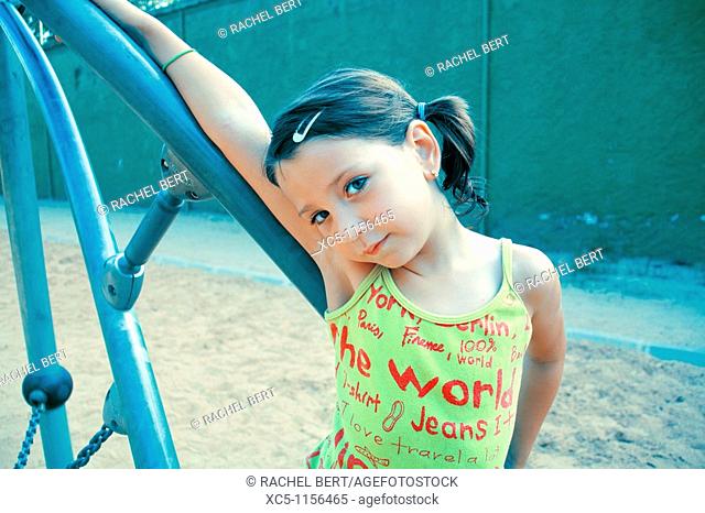 7 years old girl on the playground