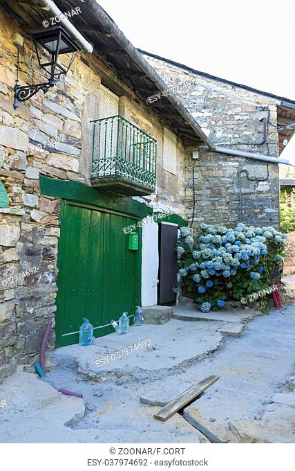 Old street, wood and stone houses in the province of Zamora in Spain