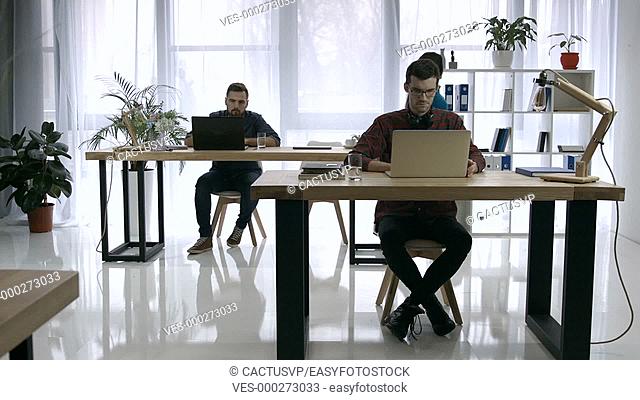 Time lapse of busy working day in creative office