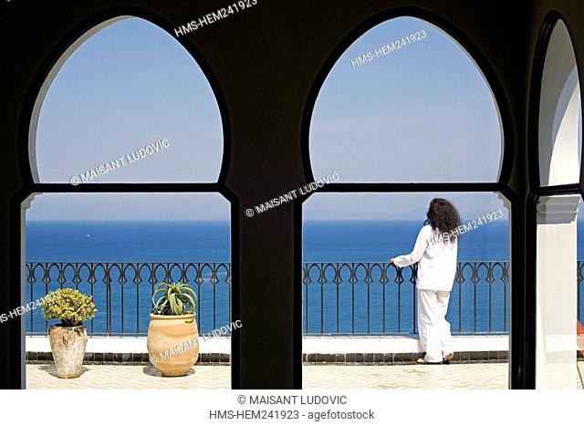 Morocco, Tangier Tetouan Region, Tangier, Kasbah, Nord-Pinus Tanger Hotel, lady client on hotel terrace looking at the Strait of Gibraltar