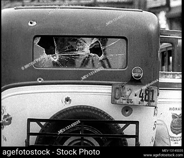 Bullet Holes Through the Back Window of a Car - New York City, United States of America