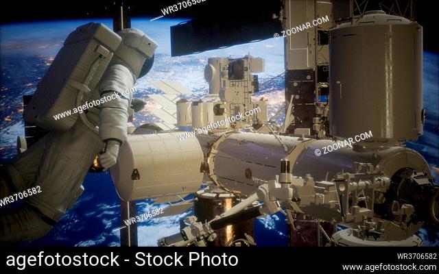 International Space Station and astronaut in outer space over the planet Earth. Elements of this image furnished by NASA