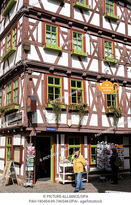 24 March 2018, Germany, Schmalkalden: Timbered houses in the listed, middle-ages old city at the old market with houses built between the 16th to 18th centuries