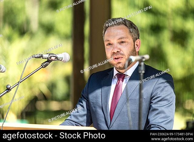 24 June 2023, Saxony, Bad Muskau: Sebastian Hecht, Head of Office at the Saxon Ministry of Finance, speaks at the ceremony marking the 200th anniversary of the...
