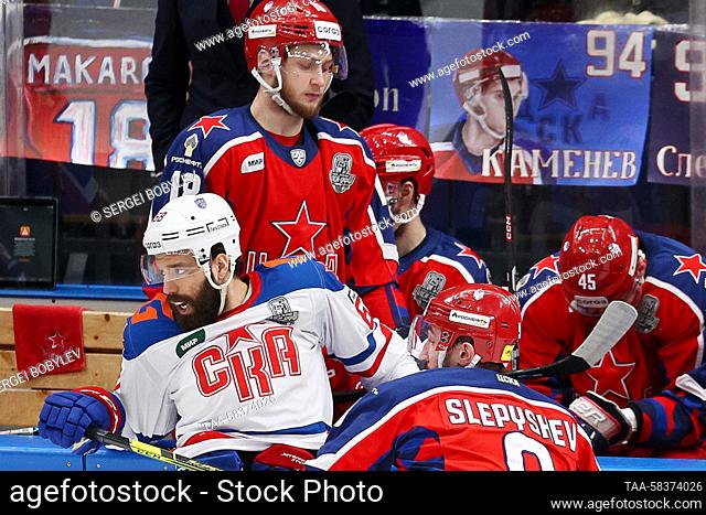 RUSSIA, MOSCOW - APRIL 12, 2023: SKA St Petersburg's Svyatoslav Grebenshchikov (L front) and CSKA Moscow's Nikolai Makarov (L midground) and Anton Slepyshev (R...