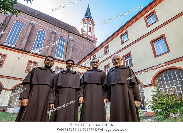 10 October 2018, Bavaria, Straubing: Father Paul (l-r), Father Anil, Father Jim and Father Englmar are standing in the Carmelite monastery