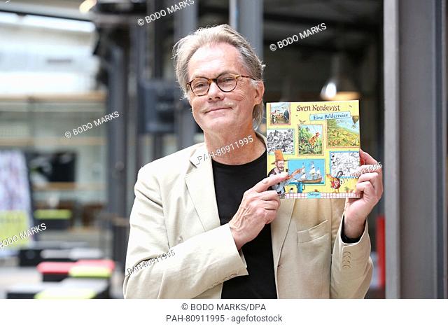 Swedish children's book author Sven Nordqvist presents his new book 'Eine Bilderreise' (lit. a journey in pictures) during a lecture at the Kampnagel centre of...