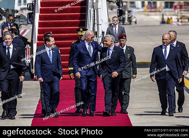 13 July 2022, Israel, Lod: (L-R) Israeli President Isaac Herzog (2nd L), Israeli Prime Minister Yair Lapid (3rd R) and Israeli Alternate Prime Minister of...