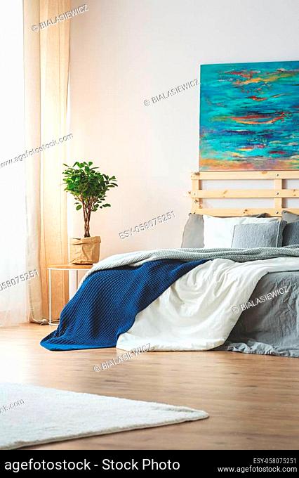 A Painting Above The Bed Stock Photos, What Size Painting Above King Bed