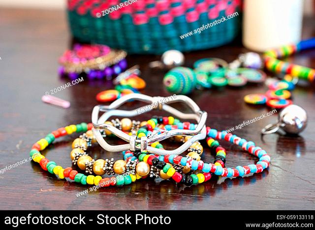 Various bracelets colorful plastic beads. Costume jewelry for woman