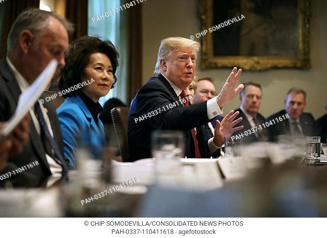 United States President Donald J. Trump (C) talks to reporters during a cabinet meeting with (L-R) US Secretary of the Interior Ryan Zinke