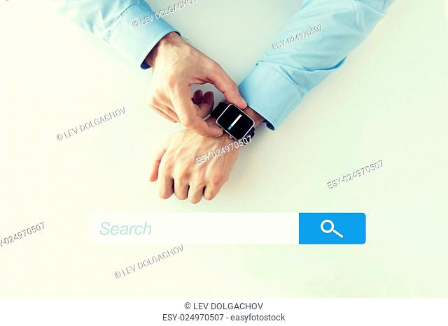 business, technology, and people concept - close up of male hands setting smart watch with web browser empty search bar on screen