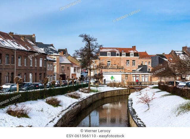 Jodoigne, Wallonia - Belgium.- Scenic view over the Gete river reflecting Old Town buildings
