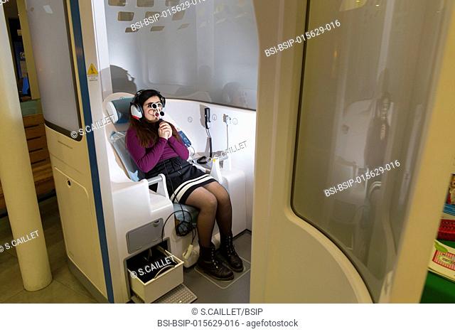 E-health monitoring booth made available for students with student health cover in Paris, France. Students can have a remote check-up, guided by adapted videos