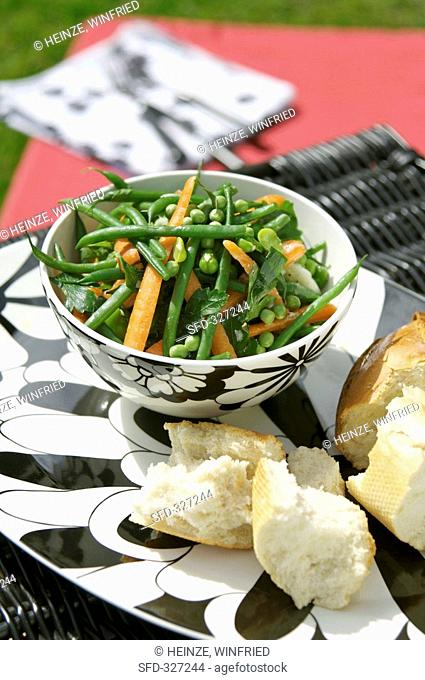 Picnic: pea, bean and carrot salad in a bowl