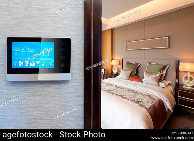 smart screen on wall in modern luxury bedroom