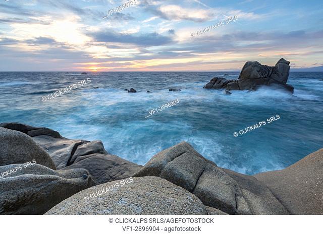 The light of sunset on blue sea framed by cliffs Capo Testa Santa Teresa di Gallura Province of Sassari Sardinia Italy Europe