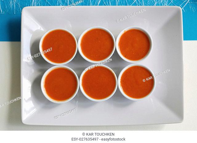 Top view of appetizers on a white plate
