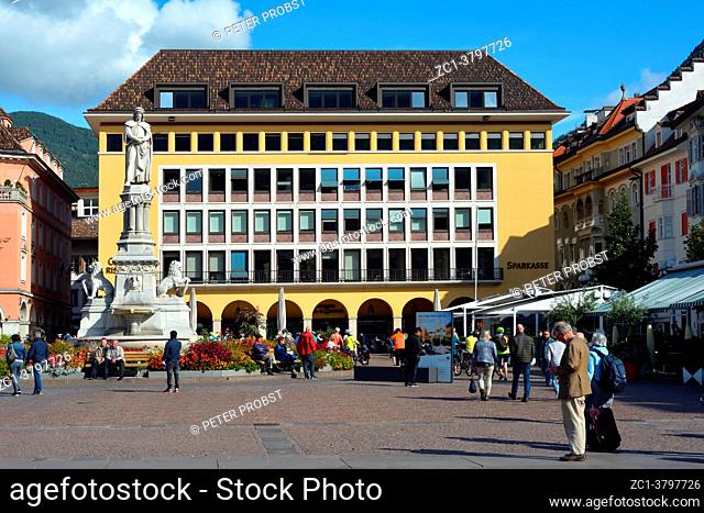 Bolzano, South Tyrol, Italy - September 18, 2017: Piazza Walther with tourists at the Monument to the poet Walther von der Vogelweide in the Old town of Bolzano...