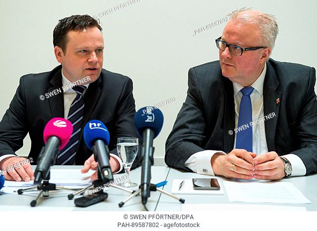 The new managing director of Kassel Aiport, Lars Ernst (L), and Hesse's minister of finance, as well as the airport's member of the board Thomas Schaefer sit...