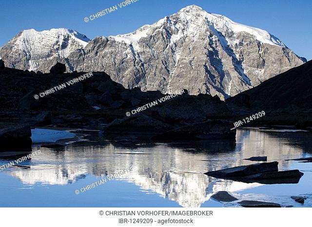 Mt. Ortler reflected in a mountain stream, Sulden, Ortler mountain range, Stelvio National Park, South Tyrol, Italy, Europe