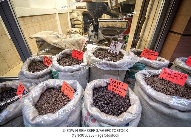 In front of a shop are linen bags filled to the brim with a variety of different blends of roasted coffee beans, Istanbul, Turkey
