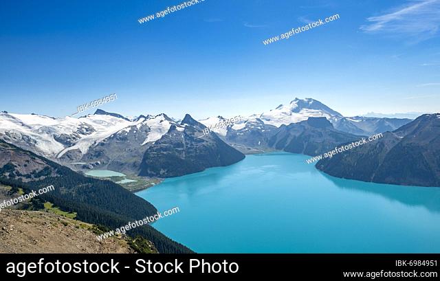 View from Panorama Ridge hiking trail, turquoise glacial Garibaldi Lake, Guard Mountain and Deception Peak, glacier behind, Garibaldi Provincial Park