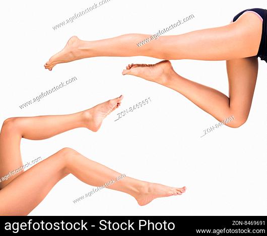Beautiful female legs isolated on white background