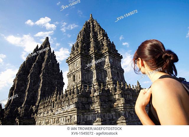 Woman looking at temple, Prambanan, Java, Indonesia